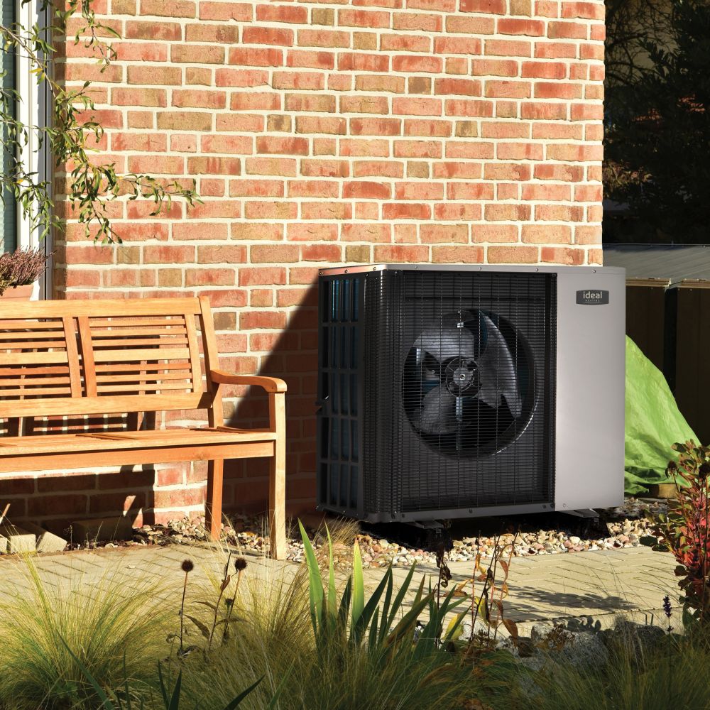 Ideal Logic Air Monobloc Low Temperature Heat Pump installed in professional garden setting with landscaping